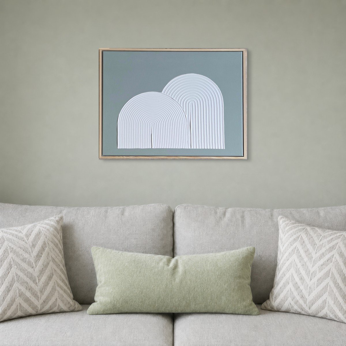 Signature Arches no 1 hung above a sofa in a sage green room